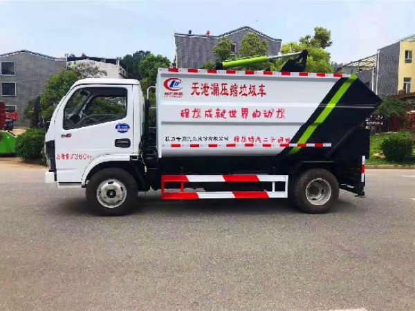 	東風小(xiǎo)多(duō)利卡國六藍(lán)牌無洩漏自裝卸（挂桶）式垃圾車(chē)
